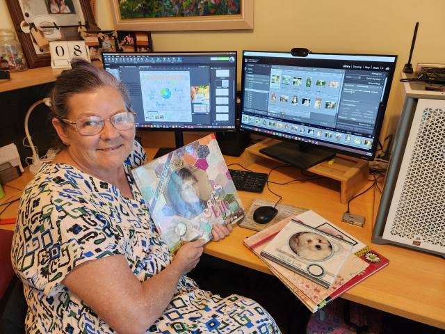 Digital Coach and Photo Manager Jenny at work preserving history